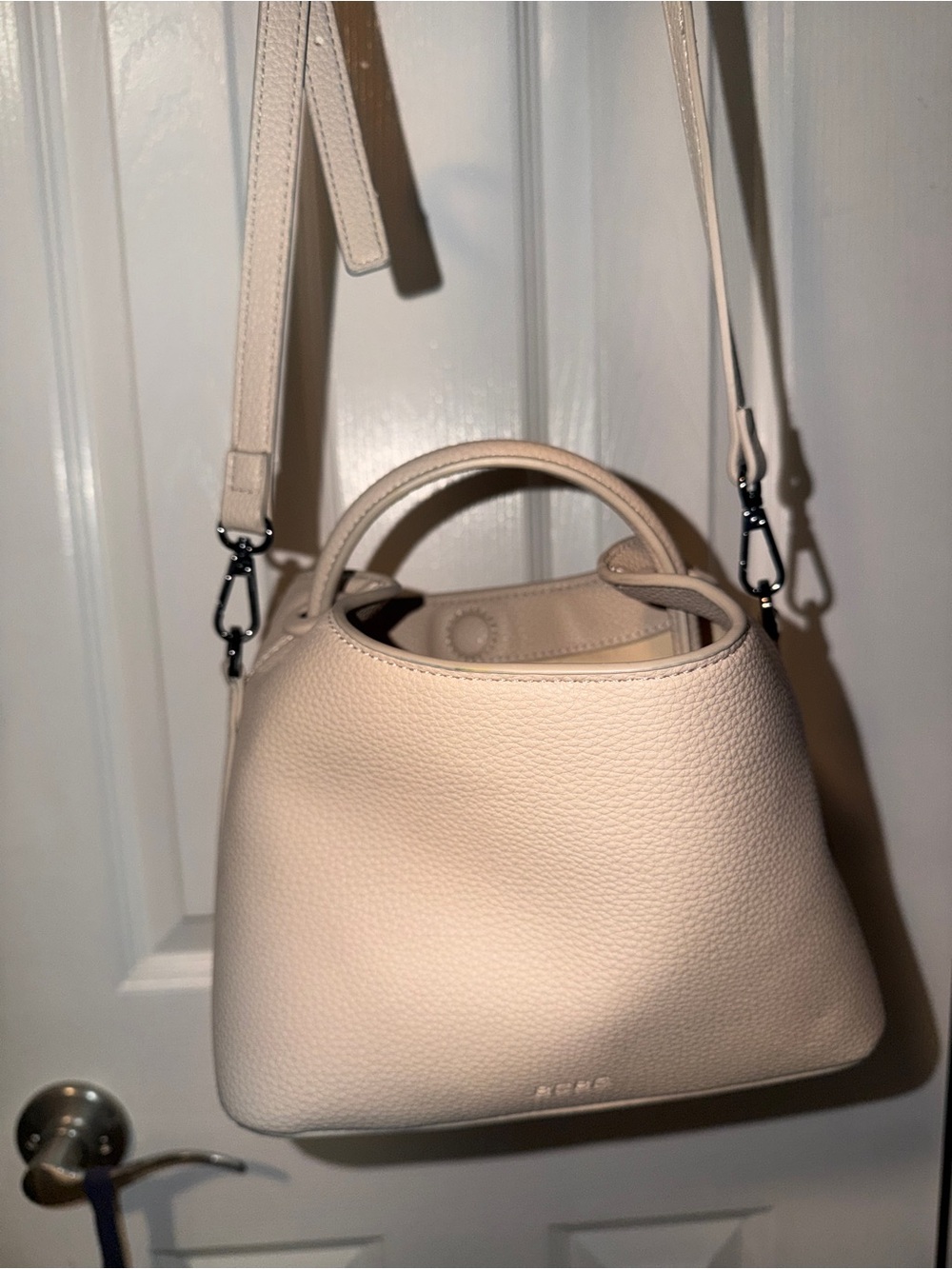 BCBG CIRCLE TOP HANDLE CLUTCH